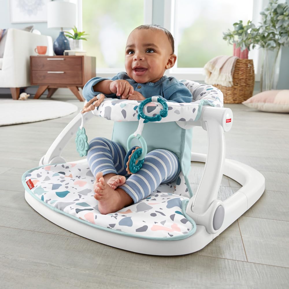 Fisher-Price Portable Baby Chair Sit-Me-Up Floor Seat with Developmental Toys & Machine Washable Seat Pad, Rainbow Showers