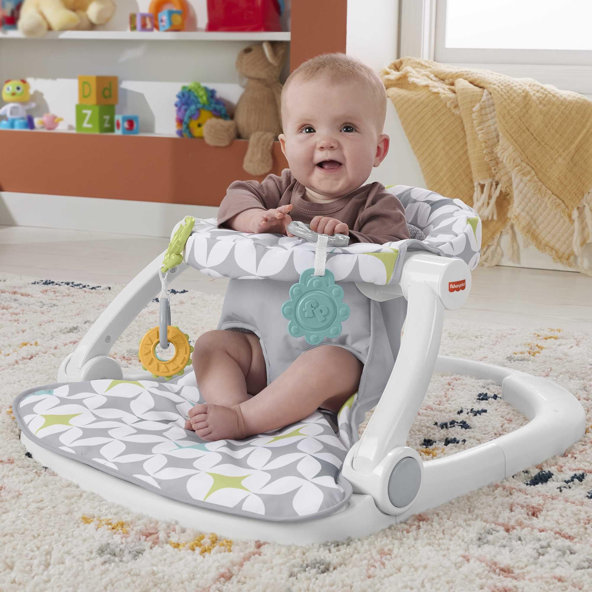 Fisher-Price Portable Baby Chair Sit-Me-Up Floor Seat with Developmental Toys & Machine Washable Seat Pad, Rainbow Showers