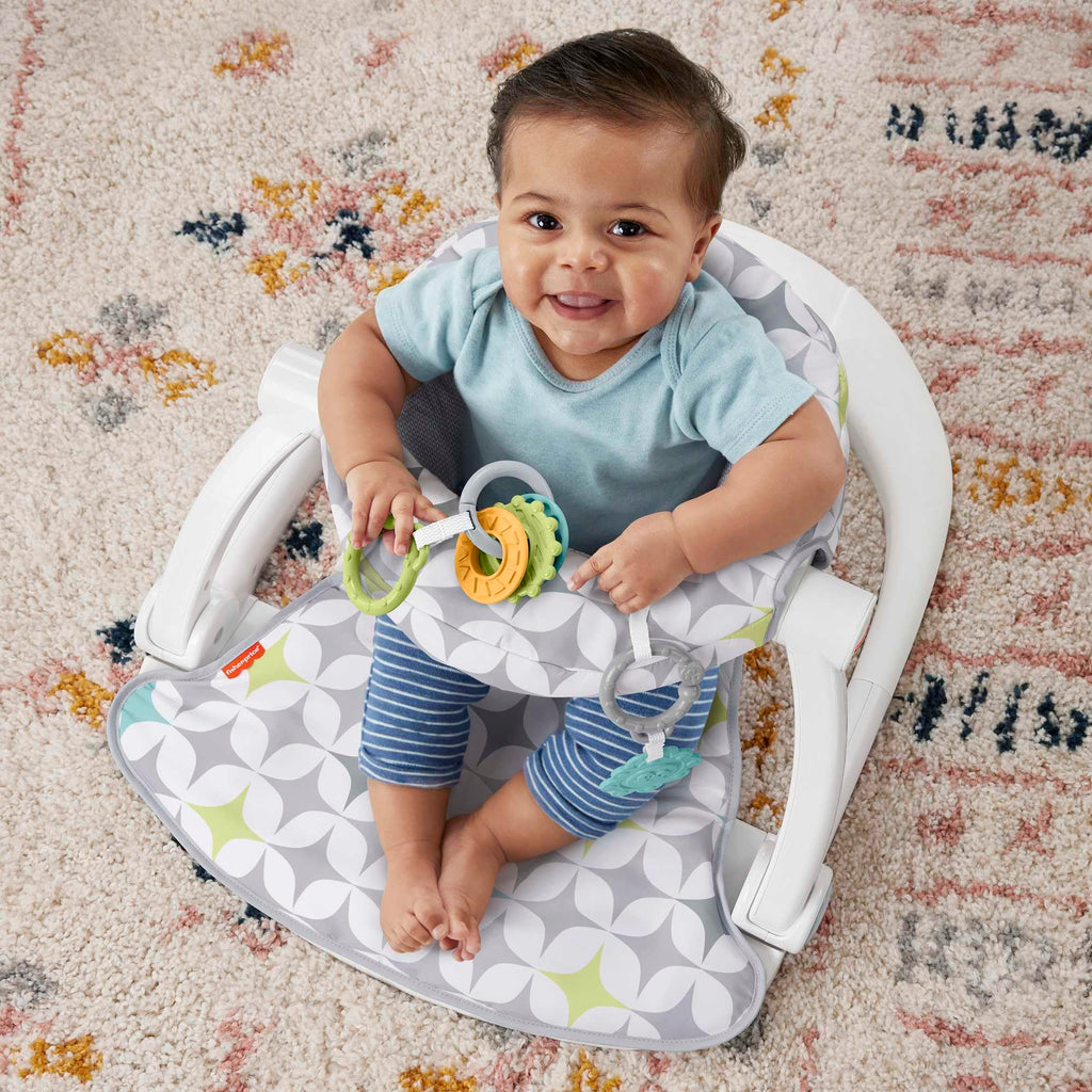 Fisher-Price Portable Baby Chair Sit-Me-Up Floor Seat with Developmental Toys & Machine Washable Seat Pad, Rainbow Showers