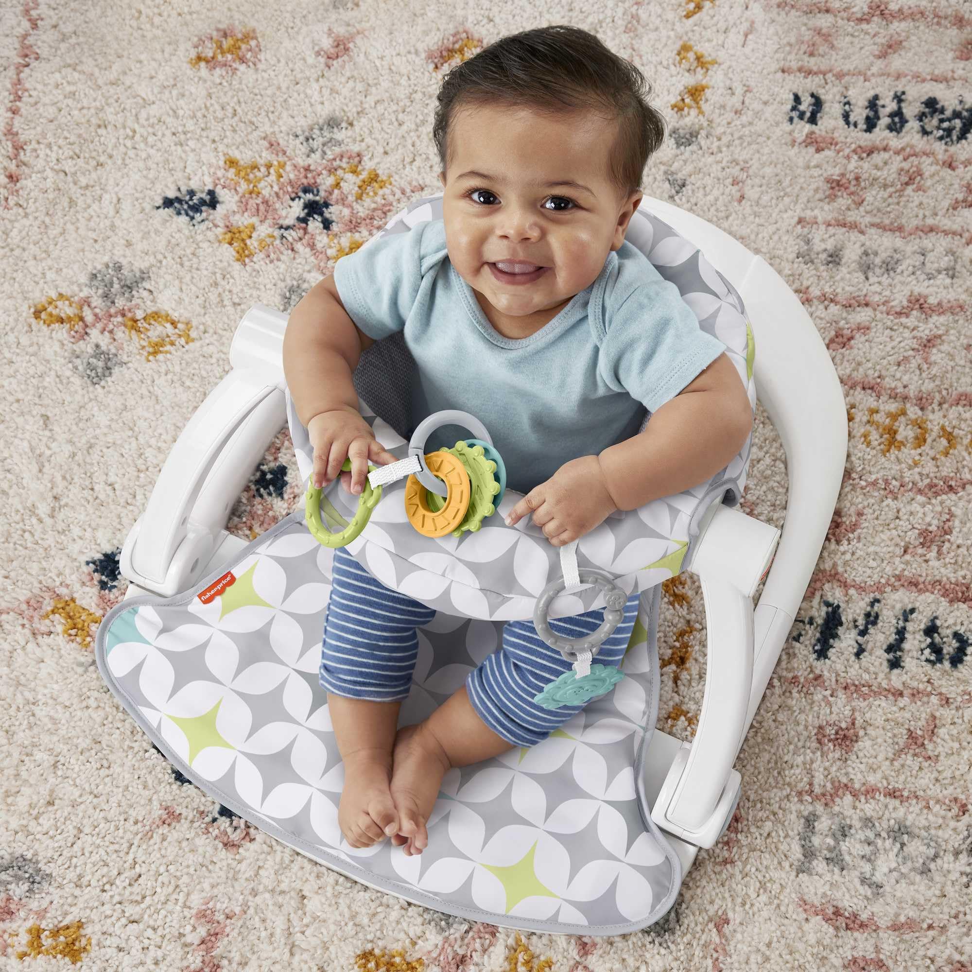 Fisher-Price Portable Baby Chair Sit-Me-Up Floor Seat with Developmental Toys & Machine Washable Seat Pad, Rainbow Showers